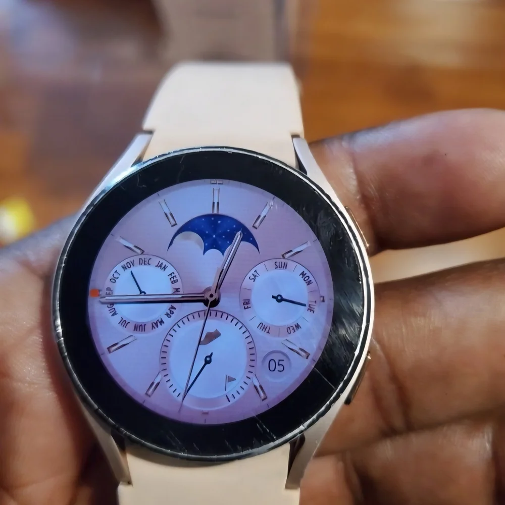 Samsung Smartwatch with Silver Bezel and Cream Band